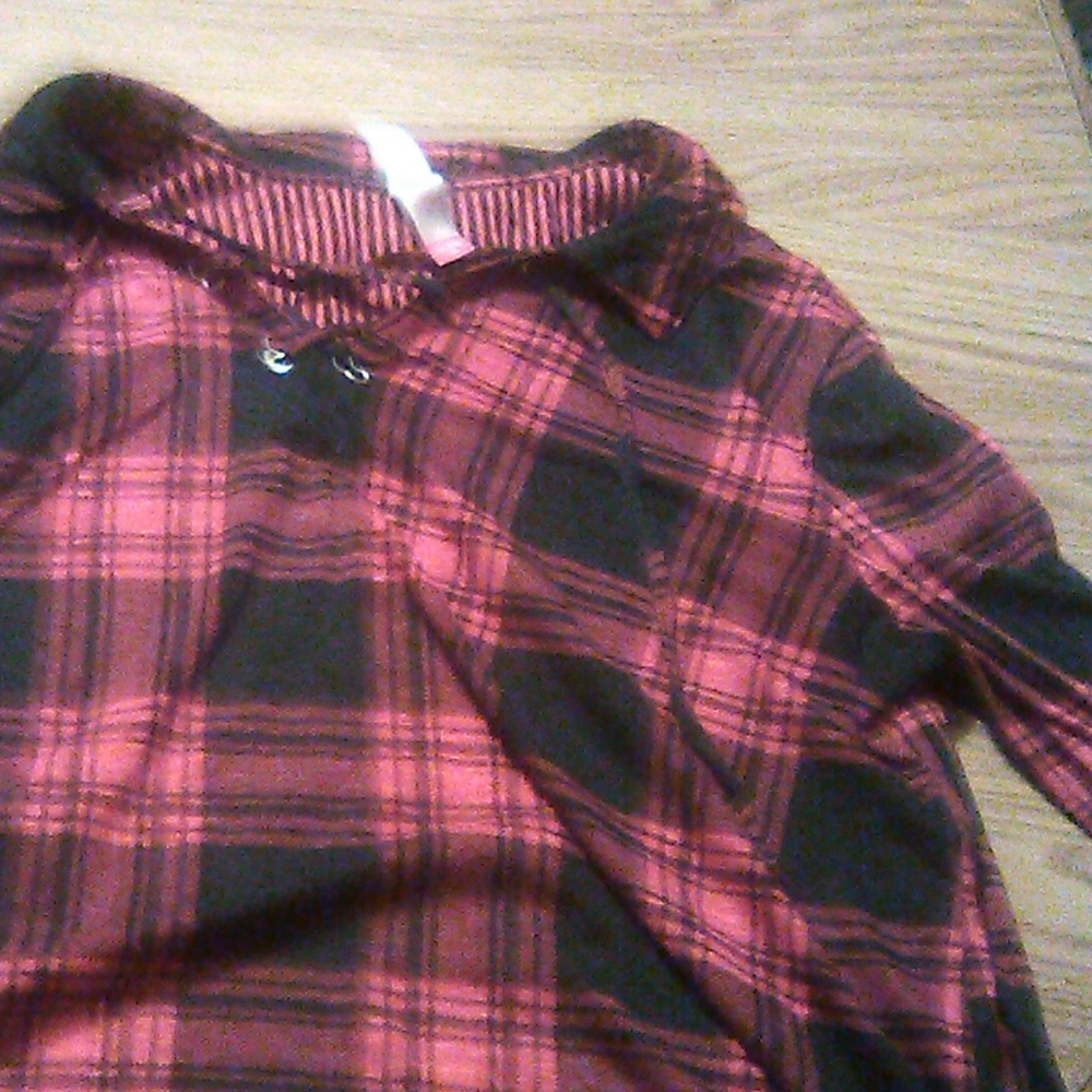 A flannel with mid length sleeves